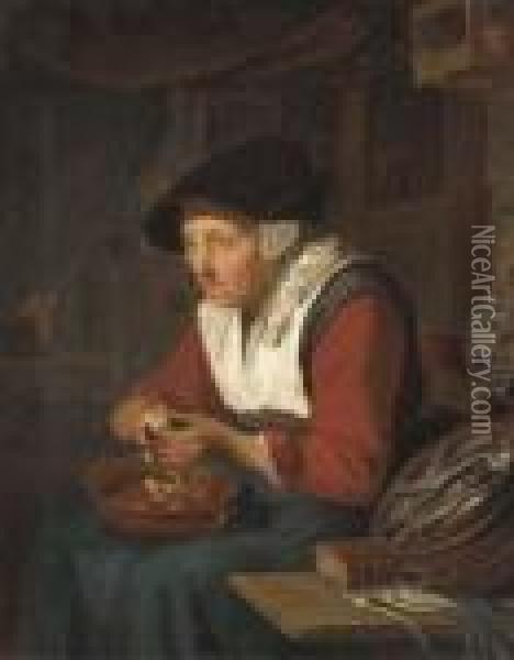 An Old Woman Peeling Apples In A Kitchen Interior Oil Painting - Gerrit Dou