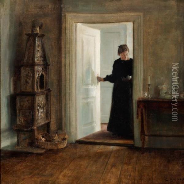 Interior With A Woman Carrying A Tray Though A Sun Lit Doorway Oil Painting - Carl Vilhelm Holsoe
