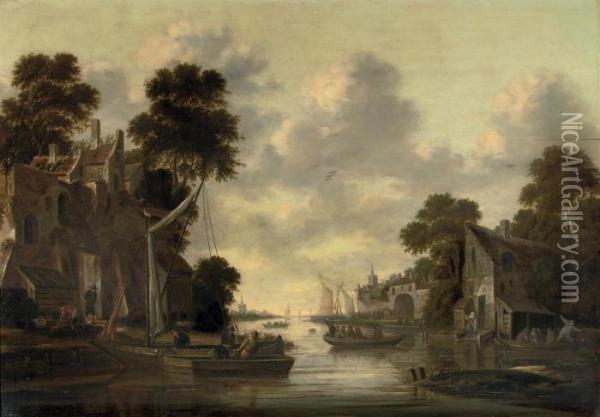 A River Landscape With Fishermen And Their Boats By A Village Oil Painting - Thomas Heeremans