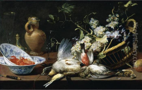 A Still Life Of A Basket Of 
Grapes, Birds, Including A Partridge, Snipe, Sparrow And Finch, Two 
Blue-and-white Oil Painting - Frans Snyders