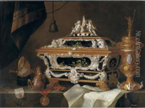 Still Life With An Elaborate 
Silver And Black Lacquer Casket, A Gilt Cup And Cover, A Teapot, A 
Letter, A Medallion, Nautilus Cup And A Watch All On A Ledge Oil Painting - Pieter Gerritsz. van Roestraten