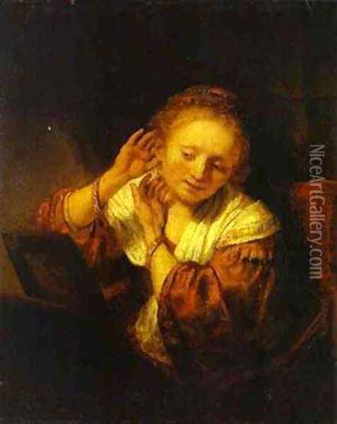 A Young Woman Trying On Earings 1657 Oil Painting - Harmenszoon van Rijn Rembrandt