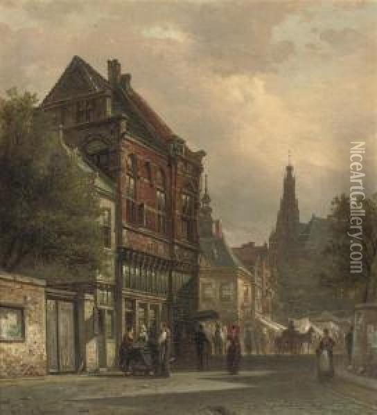 In A Sunlit Street, Hoorn Oil Painting - Elias Pieter van Bommel