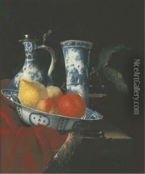 A Blue And White Wan-li Klapmuts
 Bowl With Peaches, A Lemon And Anorange, A Silver-mounted Transitional 
Ewer, A Beaker, A Glass Tazzaand A Knife On A Partly-draped Stone Ledge Oil Painting - Juriaen van Streeck