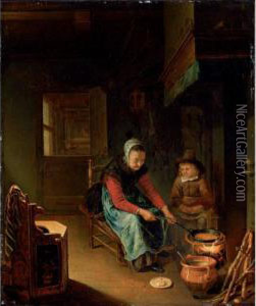 Interior With A Woman Cooking 
Pancakes With A Young Boy Before A Hearth Oil Painting - Pieter Cornelisz. van SLINGELANDT