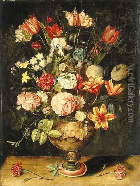 Tulips, irises, roses, carnations, lilies, narcissi and other flowers in a sculpted urn on a table Oil Painting - Andries Daniels or Danielsz