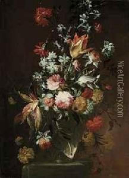 Tulips, Roses, Amaranthus, Carnations And Other Flowers In A Glassvase On A Stone Ledge Oil Painting - Vicenzino