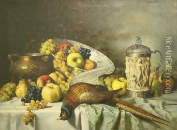 Magnificent Still Life Of Table Set With Festive Fare, Fruit In A Large Ceramic Bowl, Grapes, Game And A Carved Stein Wine Tankard With Classical Motif To The Right Oil Painting - Adolf Hacker